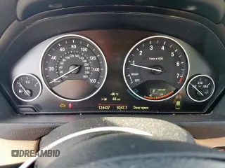 2015 BMW 3 Series 320i with VIN WBA3B1C58FK140327, listed as a Copart auction lot 57999675 with 124,437 mi miles and Salvage title. Bid and sale history available at DreamBid. Image 9.