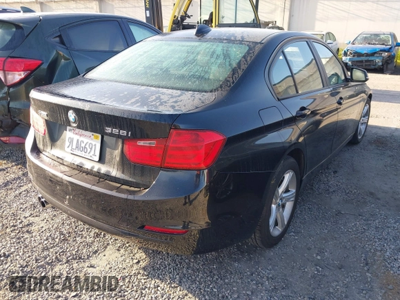 2015 BMW 3 Series 328i xDrive with VIN WBA3B3C57FF547110, listed as a IAAI auction lot 41870141 with 49,412 mi miles and . Bid and sale history available at carsss.com. Image 4.