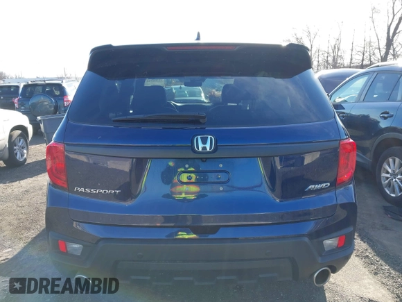 2023 Honda Passport EX-L with VIN 5FNYF8H51PB028045, listed as a IAAI auction lot 41609342 with 52,920 mi miles and . Bid and sale history available at DreamBid. Image 17.