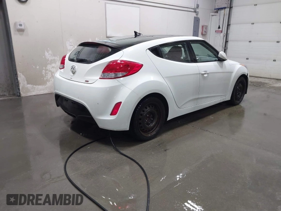 2012 Hyundai Veloster w/Black Int with VIN KMHTC6AD2CU064171, listed as a IAAI auction lot 41841873 with 192,670 mi miles and . Bid and sale history available at DreamBid. Image 4.