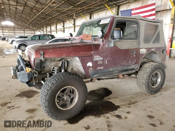2003 Jeep Wrangler Sahara with VIN 1J4FA59S03P336844, listed as a Copart auction lot 49290345 with 167,726 mi miles and Salvage title. Bid and sale history available at DreamBid. Image 1.