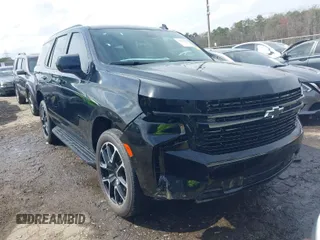 2023 Chevrolet Tahoe RST with VIN 1GNSCRKD7PR225100, listed as a IAAI auction lot 41758562 with 34,393 mi miles and . Bid and sale history available at DreamBid. Image 1.