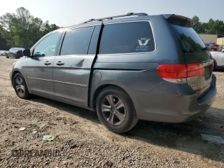 2010 Honda Odyssey Touring z VIN 5FNRL3H93AB087771, wystawiony jako Copart lot #59322835 z przebiegiem 247 000 mil mil oraz Czysty tytuł • Clean title. Historia ofert i sprzedaży dostępna na DreamBid. Obrazek 2.