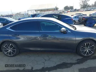 2023 Lexus ES 300h with VIN 58ADA1C15PU034077, listed as a IAAI auction lot 41956543 with 72,661 mi miles and . Bid and sale history available at DreamBid. Image 13.
