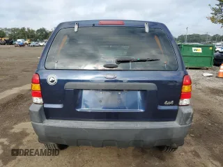 2004 Ford Escape XLS with VIN 1FMYU92104KA21454, listed as a Copart auction lot 74139564 with 217,731 mi miles and Salvage Title. Bid and sale history available at carsss.com. Image 6.