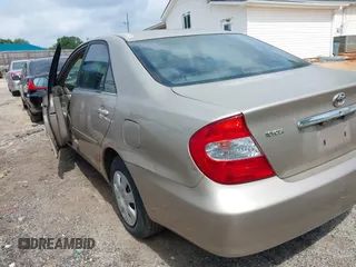 2004 Toyota Camry LE with VIN 4T1BE32K64U265994, listed as a IAAI auction lot 42015312 with 273,408 mi miles. Bid and sale history available at carsss.com. Image 3.