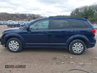 2019 Dodge Journey SE with VIN 3C4PDCBBXKT707700, listed as a IAAI auction lot 42038474 with 57,903 mi miles and . Bid and sale history available at DreamBid. Image 14.