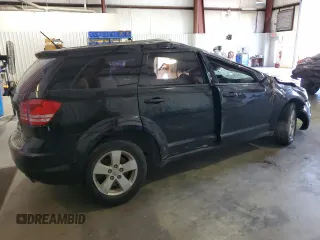 2013 Dodge Journey American Value with VIN 3C4PDCAB1DT580131, listed as a Copart auction lot 78070164 with 145,994 mi miles and Salvage Title. Bid and sale history available at DreamBid. Image 3.