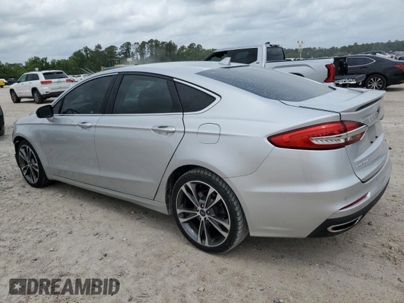 2019 Ford Fusion Titanium with VIN 3FA6P0D99KR105398, listed as a Copart auction lot 54786845 with 122,776 mi miles and Salvage title. Bid and sale history available at DreamBid. Image 2.