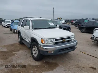 1999 Toyota 4Runner SR5 with VIN JT3GN86R4X0097609, listed as a IAAI auction lot 42370857 with 244,297 mi miles and . Bid and sale history available at DreamBid. Image 1.