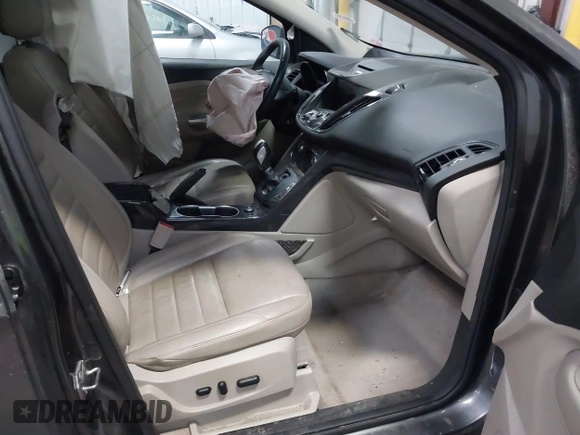 2016 Ford Escape Titanium with VIN 1FMCU9J90GUB35593, listed as a IAAI auction lot 42309020 with 173,019 mi miles and . Bid and sale history available at DreamBid. Image 5.