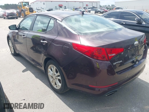 2013 Kia Optima EX with VIN 5XXGN4A7XDG177274, listed as a IAAI auction lot 42759090 with 164,212 mi miles and . Bid and sale history available at DreamBid. Image 3.