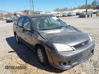 2007 Ford Focus S z VIN 1FAFP34N07W188089, wystawiony jako IAAI lot #40662400 z przebiegiem Nie podano mil oraz . Historia ofert i sprzedaży dostępna na DreamBid. Obrazek 1.
