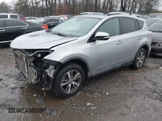 2018 Toyota RAV4 XLE with VIN 2T3RFREV2JW717351, listed as a IAAI auction lot 41576522 with 147,116 mi miles. Bid and sale history available at carsss.com. Image 17.
