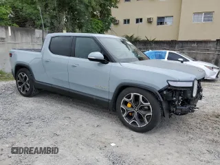 2022 Rivian R1T Launch Edition z VIN 7FCTGAALXNN004228, wystawiony jako Copart lot #43226985 z przebiegiem 4 mil mil oraz Szkody całkowita. Historia ofert i sprzedaży dostępna na DreamBid. Obrazek 4.