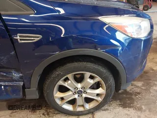 2013 Ford Escape SEL с VIN 1FMCU9H97DUD78609, выставлен на аукционе IAAI как лот 42512197 с пробегом 152 866 миль миль и . История ставок и продаж доступна на DreamBid. Изображение 14.