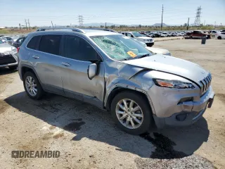 2016 Jeep Cherokee Limited with VIN 1C4PJLDBXGW229270, listed as a Copart auction lot 60097515 with 136,297 mi miles and Salvage title. Bid and sale history available at DreamBid. Image 4.