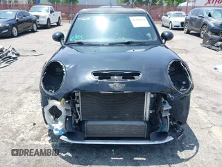 2015 MINI Hardtop 4 Door S z VIN WMWXU3C58F2B66601, wystawiony jako IAAI lot #42444404 z przebiegiem 76 174 mil mil oraz . Historia ofert i sprzedaży dostępna na DreamBid. Obrazek 13.