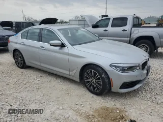 2018 BMW 5 Series 530e xDrive with VIN WBAJB1C58JB084292, listed as a Copart auction lot 51213575 with 105,277 mi miles and Clean title. Bid and sale history available at DreamBid. Image 4.