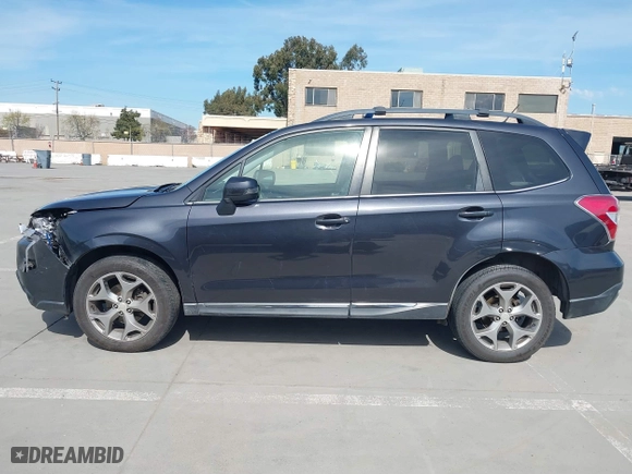 2015 Subaru Forester 2.5i Touring with VIN JF2SJAWC4FH523997, listed as a IAAI auction lot 41884674 with 175,127 mi miles. Bid and sale history available at carsss.com. Image 15.
