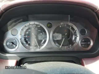 2005 Aston Martin DB9 z VIN SCFAD01A95GA00873, wystawiony jako Copart lot #63428354 z przebiegiem Nie podano mil oraz Szkody całkowita. Historia ofert i sprzedaży dostępna na DreamBid. Obrazek 9.