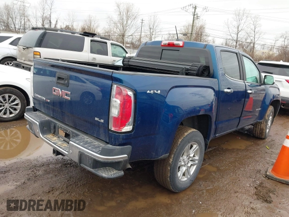 2019 GMC Canyon 4WD SLE with VIN 1GTG6CEN2K1209224, listed as a IAAI auction lot 41554534 with 65,510 mi miles. Bid and sale history available at carsss.com. Image 4.