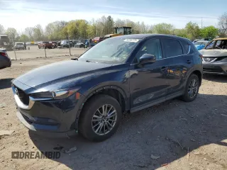 2017 Mazda CX-5 Touring with VIN JM3KFBCL4H0214579, listed as a Copart auction lot 54256775 with 95,541 mi miles and Clean Title. Bid and sale history available at carsss.com. Image 1.