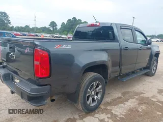 2015 Chevrolet Colorado 4WD Z71 with VIN 1GCGTCE35F1270760, listed as a IAAI auction lot 42279531 with 172,821 mi miles and . Bid and sale history available at DreamBid. Image 4.