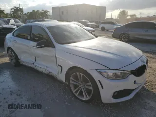 2015 BMW 4 Series 428i with VIN WBA4A5C50FG052177, listed as a Copart auction lot 86093994 with 127,956 mi miles and Salvage Title. Bid and sale history available at DreamBid. Image 4.