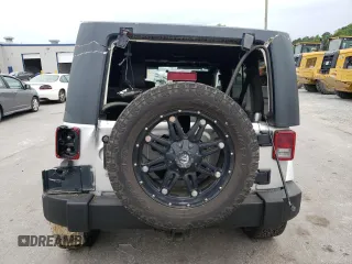 2007 Jeep Wrangler Unlimited Sahara с VIN 1J4GA591X7L158014, выставлен на аукционе Copart как лот 55201105 с пробегом 162 797 миль миль и Списание • Salvage title. История ставок и продаж доступна на DreamBid. Изображение 6.