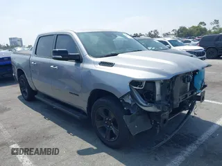 2021 Ram 1500 Lone Star with VIN 1C6RREFT7MN661083, listed as a IAAI auction lot 42488675 with 62,370 mi miles and . Bid and sale history available at DreamBid. Image 1.