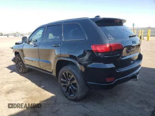 2021 Jeep Grand Cherokee Laredo X with VIN 1C4RJEAG0MC860983, listed as a Copart auction lot 57153715 with 59,697 mi miles and Clean title. Bid and sale history available at DreamBid. Image 2.