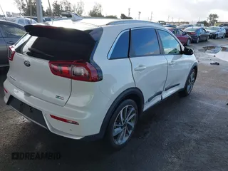 2019 Kia Niro Touring with VIN KNDCE3LC6K5336361, listed as a IAAI auction lot 41592273 with 86,286 mi miles. Bid and sale history available at carsss.com. Image 4.