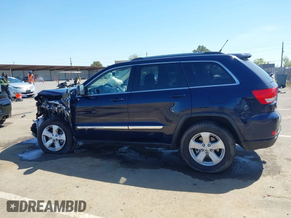 2012 Jeep Grand Cherokee Laredo with VIN 1C4RJFAG0CC160255, listed as a IAAI auction lot 41967809 with 127,702 mi miles. Bid and sale history available at carsss.com. Image 15.