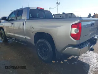 2014 Toyota Tundra SR with VIN 5TFRM5F13EX078411, listed as a IAAI auction lot 42702477 with 123,336 mi miles and . Bid and sale history available at DreamBid. Image 3.