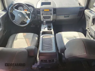 2012 Nissan Titan SL with VIN 1N6BA0EC9CN324495, listed as a Copart auction lot 60982445 with 142,430 mi miles and Salvage title. Bid and sale history available at DreamBid. Image 8.