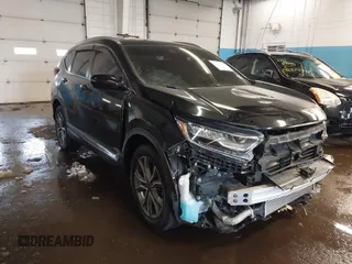 2020 Honda CR-V Touring with VIN 2HKRW2H94LH663650, listed as a IAAI auction lot 41570549 with 29,571 mi miles and . Bid and sale history available at DreamBid. Image 1.