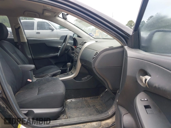 2009 Toyota Corolla with VIN 1NXBU40E19Z135389, listed as a IAAI auction lot 42188550 with 215,054 mi miles. Bid and sale history available at carsss.com. Image 5.