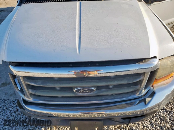 1999 Ford F-350 XL with VIN 1FTSW30F4XEB76477, listed as a Copart auction lot 56373415 with 240,170 mi miles and Salvage title. Bid and sale history available at DreamBid. Image 11.