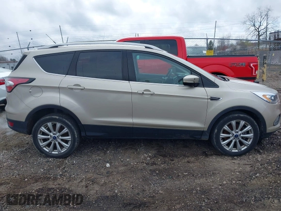 2017 Ford Escape Titanium with VIN 1FMCU9JD1HUB05881, listed as a IAAI auction lot 41966842 with 185,963 mi miles. Bid and sale history available at carsss.com. Image 13.