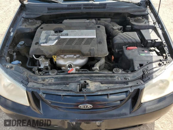 2006 Kia Spectra EX with VIN KNAFE121065348140, listed as a Copart auction lot 70874144 with 181,710 mi miles and Salvage Title. Bid and sale history available at carsss.com. Image 12.
