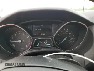 2016 Ford Focus Titanium z VIN 1FADP3N23GL345904, wystawiony jako Copart lot #60139525 z przebiegiem 97 572 mil mil oraz Szkoda całkowita • Salvage title. Historia ofert i sprzedaży dostępna na DreamBid. Obrazek 9.
