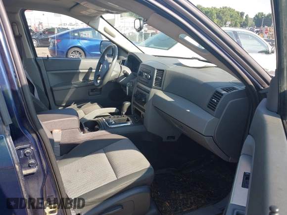 2005 Jeep Grand Cherokee Laredo with VIN 1J4HR48N45C605543, listed as a IAAI auction lot 42612473 with 158,456 mi miles and . Bid and sale history available at DreamBid. Image 5.