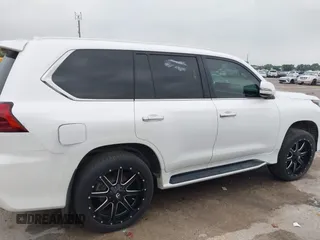2017 Lexus LX 570 z VIN JTJHY7AX4H4243313, wystawiony jako IAAI lot #41738205 z przebiegiem 88 773 mil mil oraz . Historia ofert i sprzedaży dostępna na DreamBid. Obrazek 13.