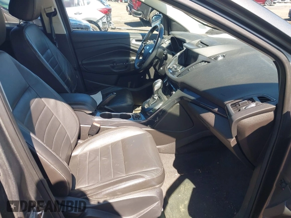 2014 Ford Escape Titanium with VIN 1FMCU9JX1EUB94776, listed as a IAAI auction lot 42063678 with 138,036 mi miles. Bid and sale history available at carsss.com. Image 5.
