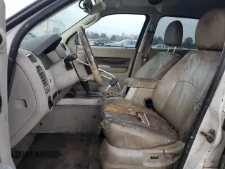 2011 Mercury Mariner Premier with VIN 4M2CN8H71BKJ06909, listed as a Copart auction lot 81713714 with 228,992 mi miles and Salvage Title. Bid and sale history available at carsss.com. Image 7.