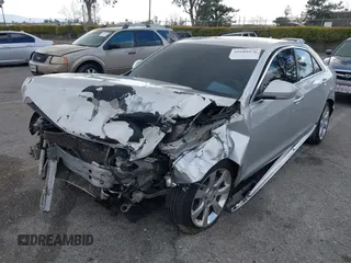 2013 Cadillac ATS Luxury with VIN 1G6AB5RX4D0154991, listed as a IAAI auction lot 41688976 with 136,238 mi miles and . Bid and sale history available at DreamBid. Image 2.