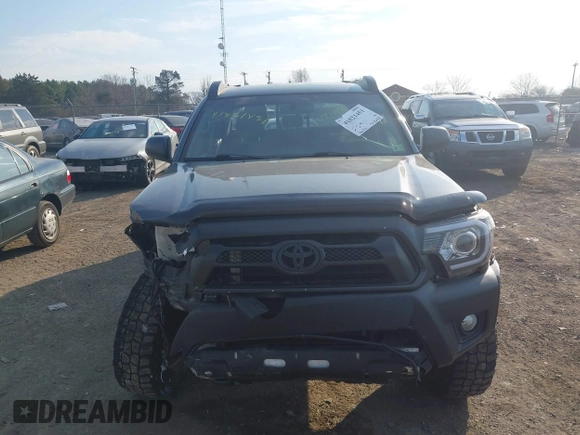 2014 Toyota Tacoma with VIN 3TMLU4EN3EM151545, listed as a IAAI auction lot 41821451 with 261,311 mi miles. Bid and sale history available at carsss.com. Image 13.