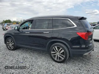 2017 Honda Pilot Touring with VIN 5FNYF6H9XHB075468, listed as a Copart auction lot 50012215 with 90,718 mi miles and Salvage Title. Bid and sale history available at carsss.com. Image 2.