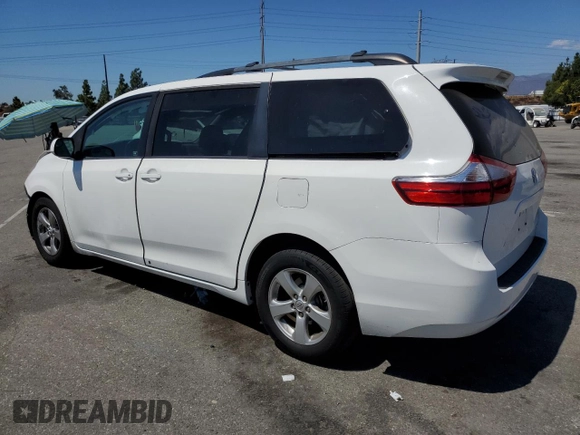 2016 Toyota Sienna LE AAS with VIN 5TDKK3DC4GS717016, listed as a Copart auction lot 70089664 with 131,654 mi miles and Salvage Title. Bid and sale history available at carsss.com. Image 2.